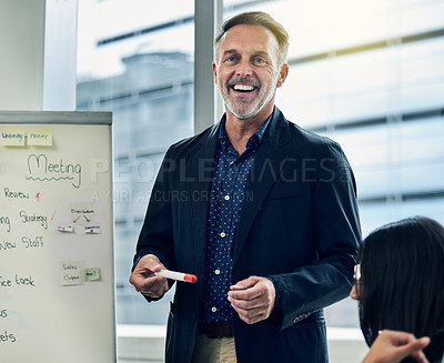 Buy stock photo Happy businessman, coaching and presentation on whiteboard in meeting, planning or strategy at the office. Man CEO or coach training staff in team discussion for project plan or idea at the workplace