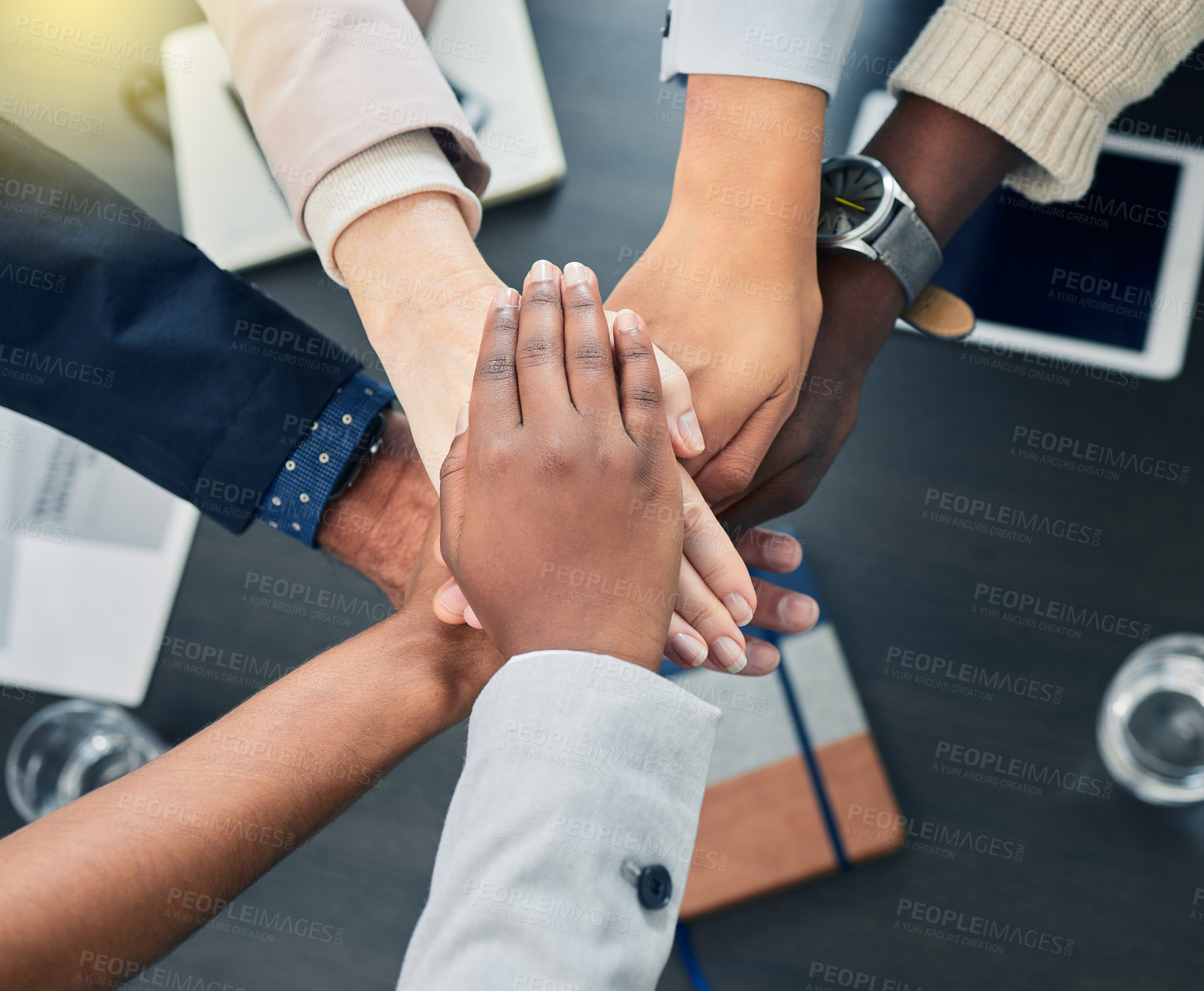 Buy stock photo Business people, teamwork and hands together above in support, trust or agreement for unity. Closeup group of employees touching hand for team building, motivation or collaboration in solidarity