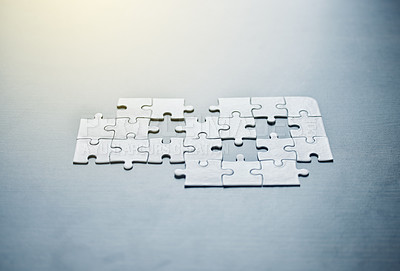 Buy stock photo Shot of a puzzle on  a table in an office