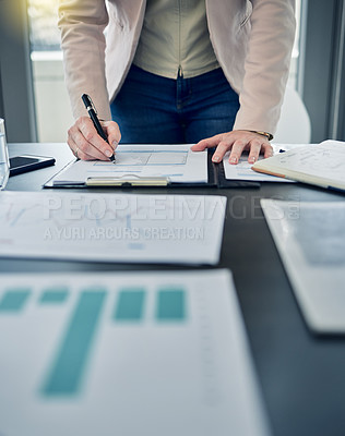 Buy stock photo Closeup, business person or employee with paperwork, signing or contract for a promotion, planning or budget. Zoom, entrepreneur or ceo with documents, professional or writing with review or feedback