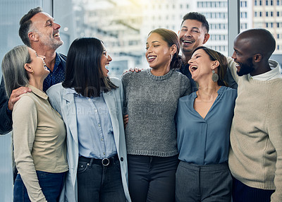 Buy stock photo Shot of a team of colleagues together in their office