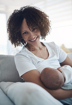 Buy stock photo Happy, portrait and mom breastfeeding her baby for health, nutrition and wellness at home. Bonding, love and young mother nursing or feeding her newborn child milk on the sofa in their family house.