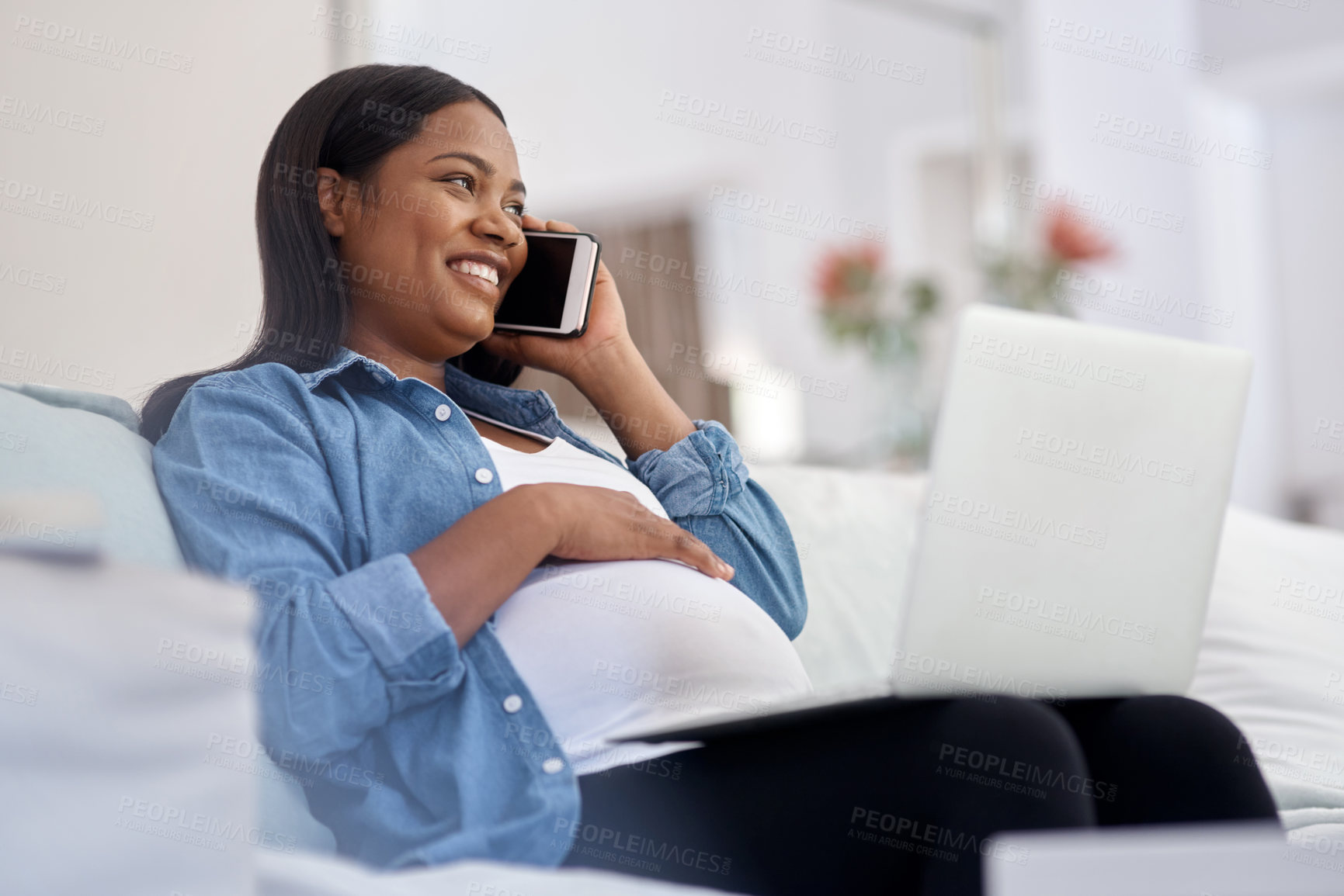 Buy stock photo Smile, laptop and pregnant woman with phone call on sofa, telehealth and booking medical appointment. Tech, talking and person with contact for maternity question, home and prenatal wellness advice