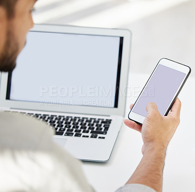 Buy stock photo Shot of a unreconizable man using his cellphone at work in a modern office