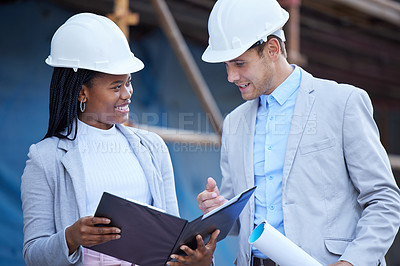 Buy stock photo Collaboration, construction and documents with engineer people outdoor on building site together. Architecture, diversity or teamwork with man and woman reading blueprint for project management