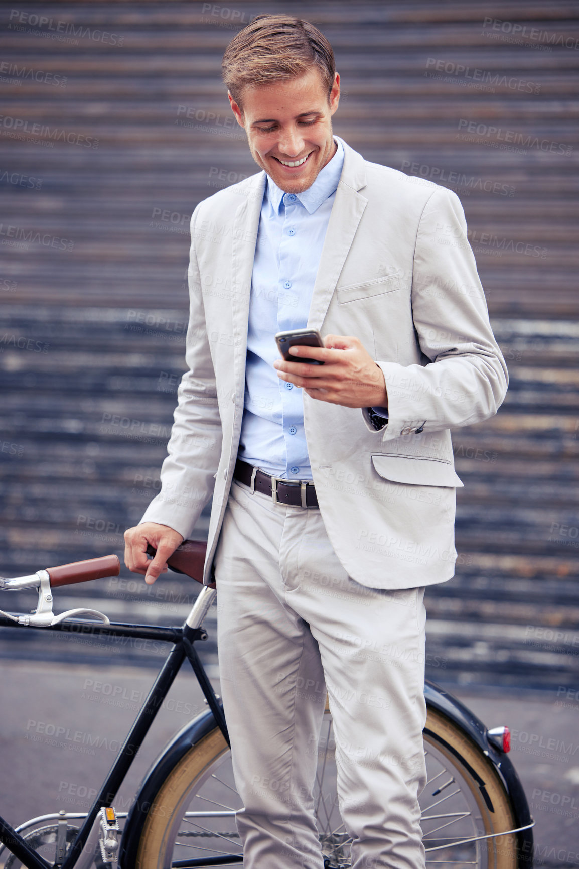 Buy stock photo Businessman, bicycle and phone on street for internet, reading text and commute. Employee, bike and mobile app by sidewalk with sustainable transport for work travel, web connection and social media