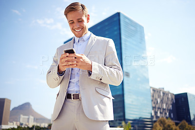 Buy stock photo Smile, phone and businessman scroll in city for reading email, news or typing on website outdoor in low angle. Mobile, professional and happy agent in town for social media, network or online app