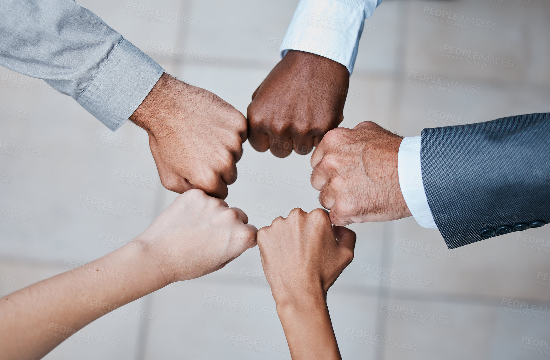 Buy stock photo Business people, office and fist bump in circle for support, collaboration and professional synergy. Teamwork, solidarity and hands together for productivity huddle, diversity and project management