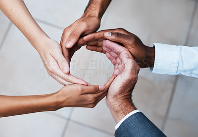 Buy stock photo Cropped shot of a group of unrecognizable people joining hands in solidarity