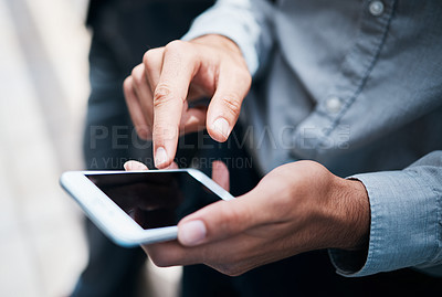 Buy stock photo Cropped shot of a businessman using a phone