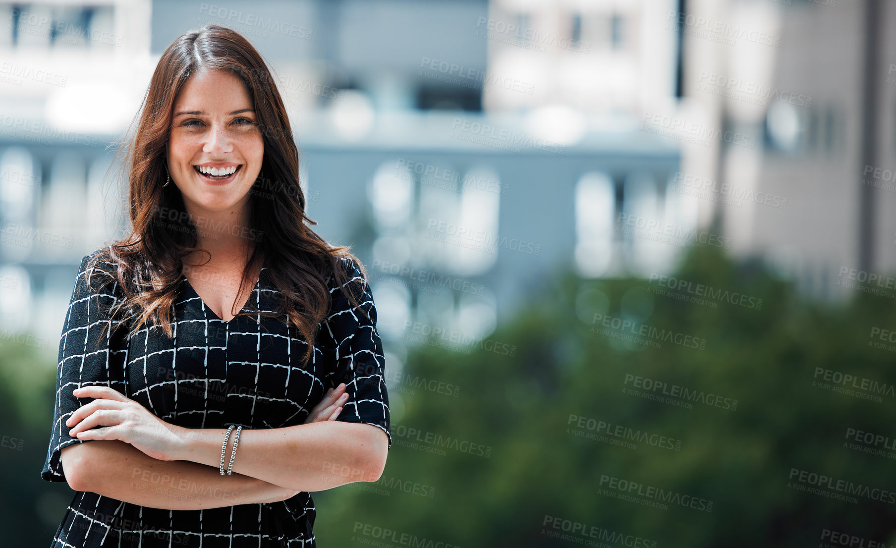 Buy stock photo Arms crossed, portrait and business woman in city with smile for inspiration or new job opportunity. Creative, designer and happy of confident employee outdoor in urban town for expert career