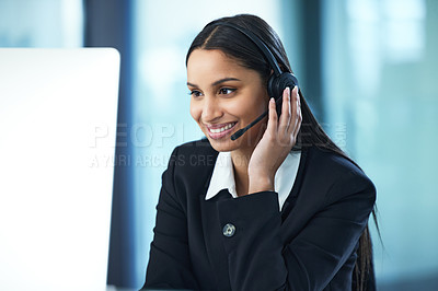 Buy stock photo Shot of a young businesswoman working in a call center