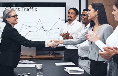 Buy stock photo Shot of coworkers applauding during a business meeting