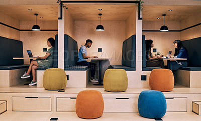 Buy stock photo Shot of creatives working in cubicles