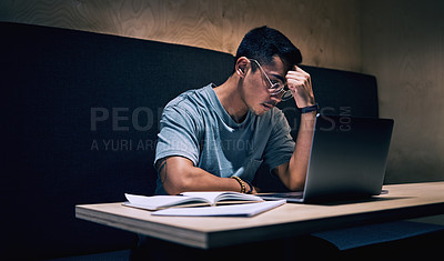 Buy stock photo Remote work, stress and businessman at cafe with laptop, book or headache from 404, glitch or connection fail. Night, restaurant and freelance writer with deadline anxiety, burnout or article doubt