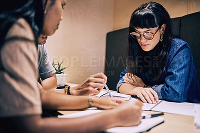 Buy stock photo Business people, group and planning in cafe for remote work with teamwork, paperwork or serious for discussion. Collaboration, employees or meeting for brainstorming, strategy and creative solutions 