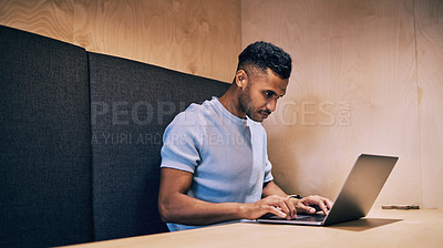 Buy stock photo Businessman, designer and typing with laptop at office in cubicle for research, email or communication. Man or creative employee working or reading on computer for online news or startup at workplace