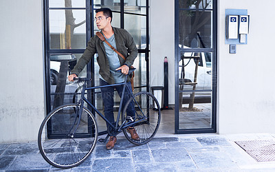 Buy stock photo Travel, apartment and man with bicycle in city commuting to work for creative career. Transport, street and male designer with carbon footprint for cycling to office with bike in town in Amsterdam.