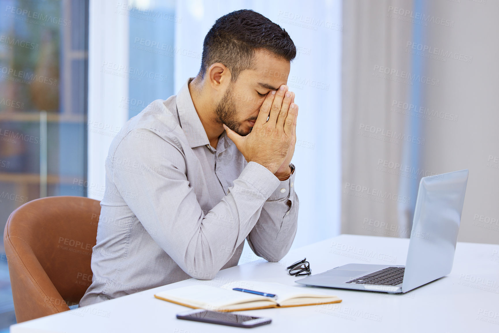 Buy stock photo Man, stress and headache with laptop in office for fatigue, deadline or worry for story at media company. Staff writer, editor and journalist with burnout, tired or research for newsletter at startup