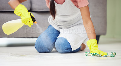 Buy stock photo Cropped shot of a woman cleaning the floor at home