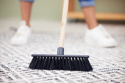 Buy stock photo Legs, broom and carpet in home, living room and spring cleaning service for dust, bacteria or dirt for health. Person, housework and cleaner with sweeping for flooring, rug or job at house in Mexico