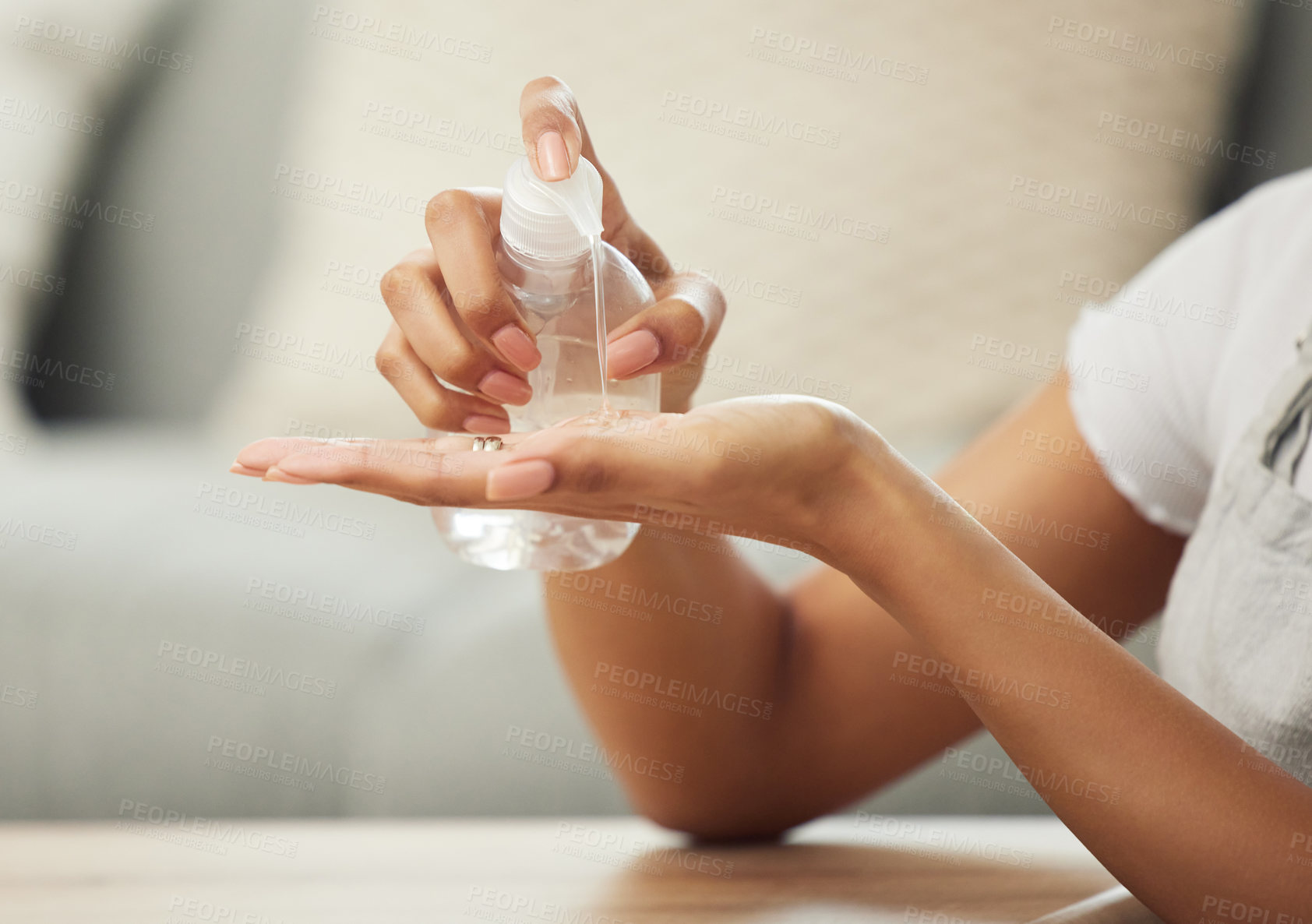 Buy stock photo Woman, hands and closeup of sanitizer for hygiene with spray bottle, bacteria and disinfection in home. Person, liquid cleaner and routine for germs, cleaning and health in living room or lounge