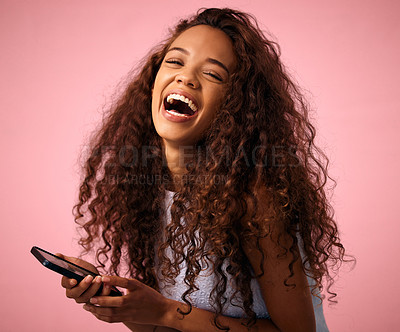 Buy stock photo Happy woman, portrait and laughing with phone for funny meme, joke or social media on a pink studio background. Female person with smile in laughter for chat, humor or comedy on mobile smartphone