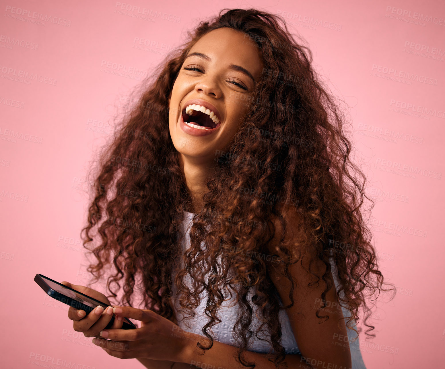 Buy stock photo Happy woman, portrait and laughing with phone for funny meme, joke or social media on a studio background. Female person with smile in laughter for chat, humor or comedy on mobile smartphone
