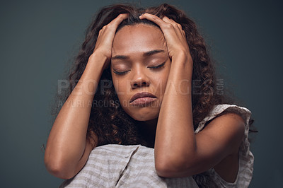 Buy stock photo Stress, girl and depressed with headache in studio for burnout or mistake with anxiety and unhappy. Black woman, isolated and green background with eyes closed for migraine, worry and mental health.