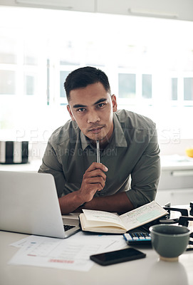 Buy stock photo Thinking, man and laptop in kitchen portrait for planning, finances or investment budget for home maintenance. Person, contemplating and making notes in book for expenses, earnings and savings