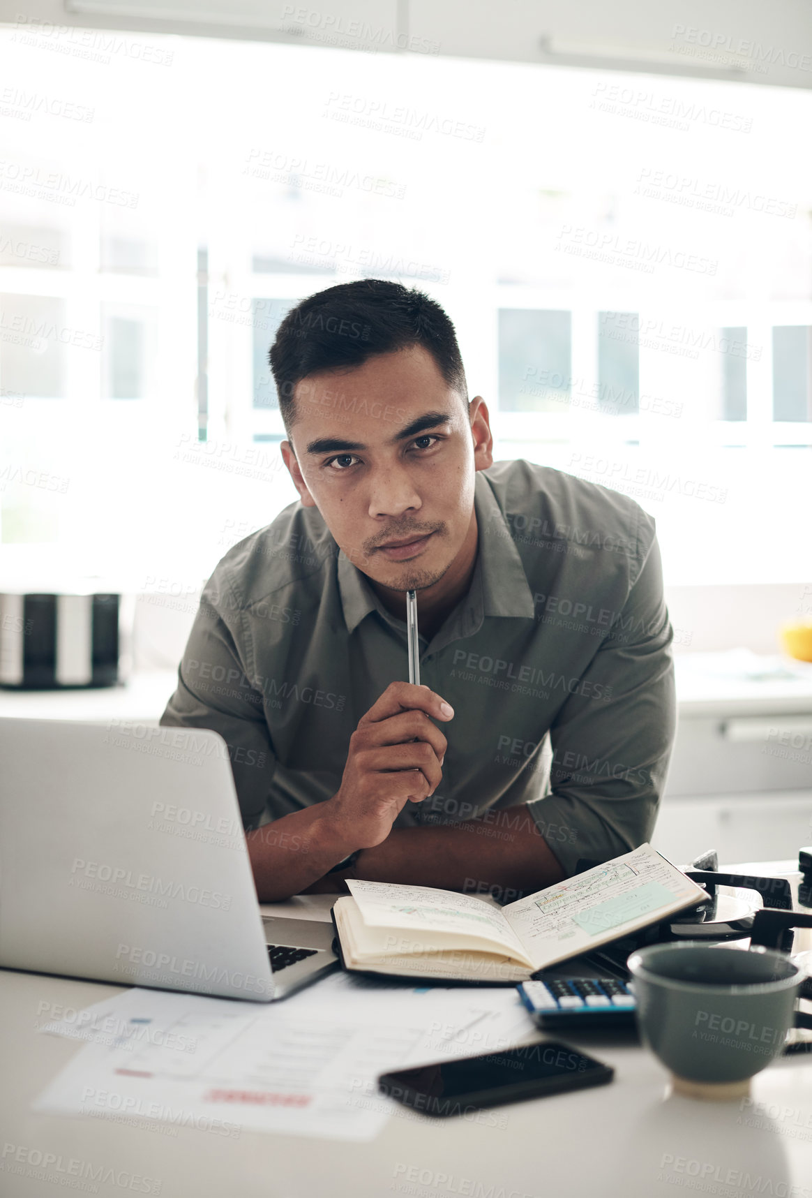 Buy stock photo Thinking, man and laptop in kitchen portrait for planning, finances or investment budget for home maintenance. Person, contemplating and making notes in book for expenses, earnings and savings