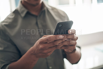 Buy stock photo Hands, home and man online with smartphone for trending updates or popular topics on social media or internet. Person, mobile phone and texting for messaging or connectivity, streaming and download.