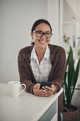 Buy stock photo Phone, portrait or woman in home with tea, coffee or smile to relax on social media, internet or blog website. Technology, glasses or happy Asian lady on mobile app to search for news post or article