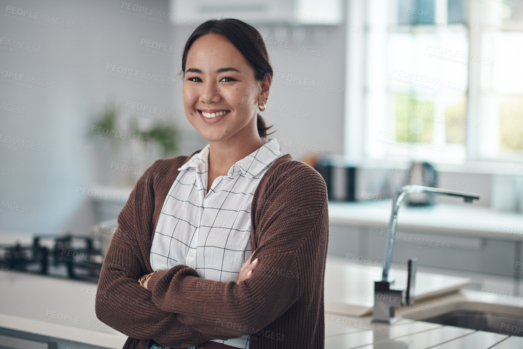 Buy stock photo Asian woman, smile and arms crossed, excited for real estate or purchasing house with kitchen in portrait. Korean, female person and happiness for homeowner with renovated apartment to relax and rest