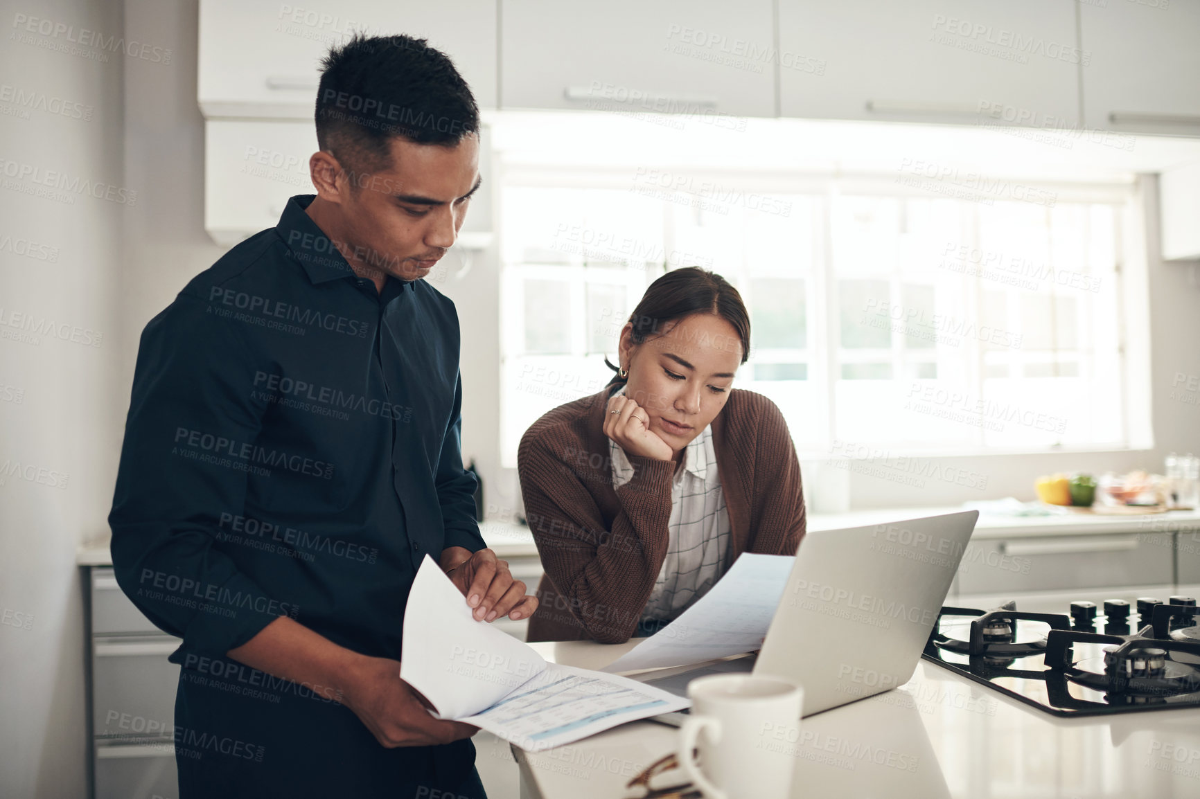 Buy stock photo Laptop, recession or couple with budget paperwork, mortgage debt or banking documents in home. Interracial, sad woman or man reading financial investment portfolio or planning loan bills with stress