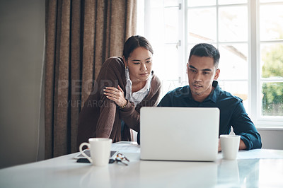 Buy stock photo Couple, laptop and online with budget in kitchen for savings, investment tips or mortgage information. Finance, people and technology with research for debt review, insurance policy or tax documents 