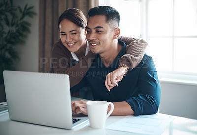 Buy stock photo Couple, laptop and happy with budgeting in kitchen for savings, investment and mortgage payment with hug. Finance, people and technology with smile for debt review, insurance policy or tax documents 