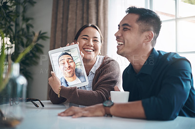 Buy stock photo Couple of friends, video call and tablet screen with people laughing in living room of home together. Face, funny or humor with happy young man and woman in apartment for communication or online chat