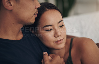 Buy stock photo Couple, hug and relax on couch for love, security and romance on home date and weekend. People, peace and bonding in embrace for marriage, support and trust in connection or comfort in closeup