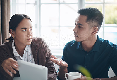 Buy stock photo Home, stress and couple with tablet, budget and conversation with planning and financial crisis. Debt, apartment and man with woman and tech with mortgage loan and inflation with taxes and talking
