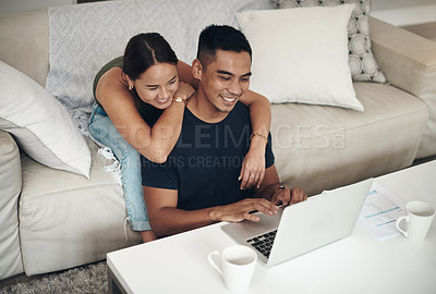 Buy stock photo Laptop, smile and Asian couple in home for budget, savings or insurance at table in living room. Computer, man and woman on sofa for mortgage, financial planning and asset management on email online