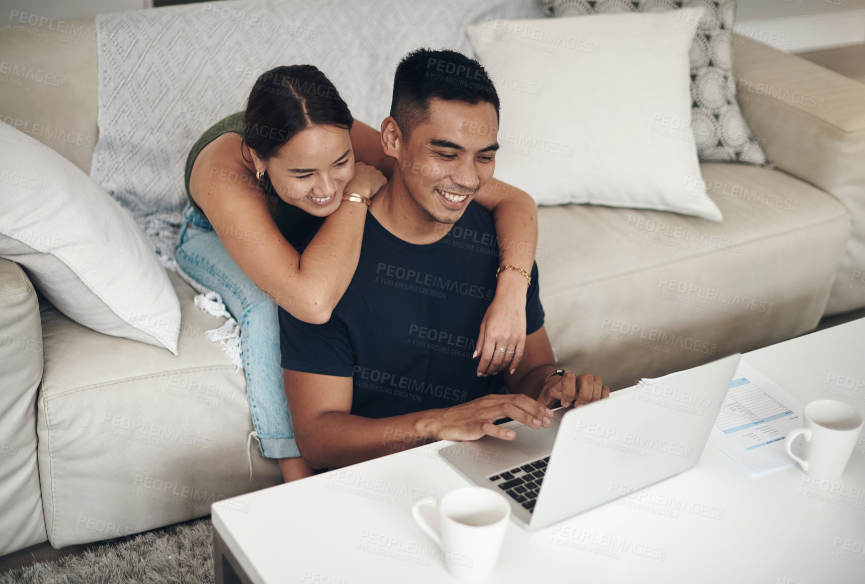 Buy stock photo Laptop, smile and Asian couple in home for budget, savings or insurance at table in living room. Computer, man and woman on sofa for mortgage, financial planning and asset management on email online