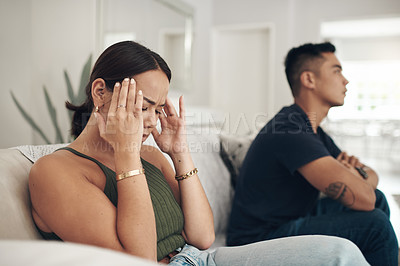 Buy stock photo Frustrated couple, argument and fight with headache on sofa for breakup, conflict or disagreement at home. Upset or young woman and man ignoring partner in breakup, divorce or separation at the house