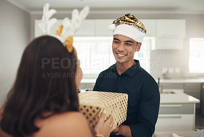 Buy stock photo Man, couple and christmas gift for celebration in home  with happy partner. Asian guy, festive present and surprise box to celebrate love, care and excited holidays in house, happiness and together 