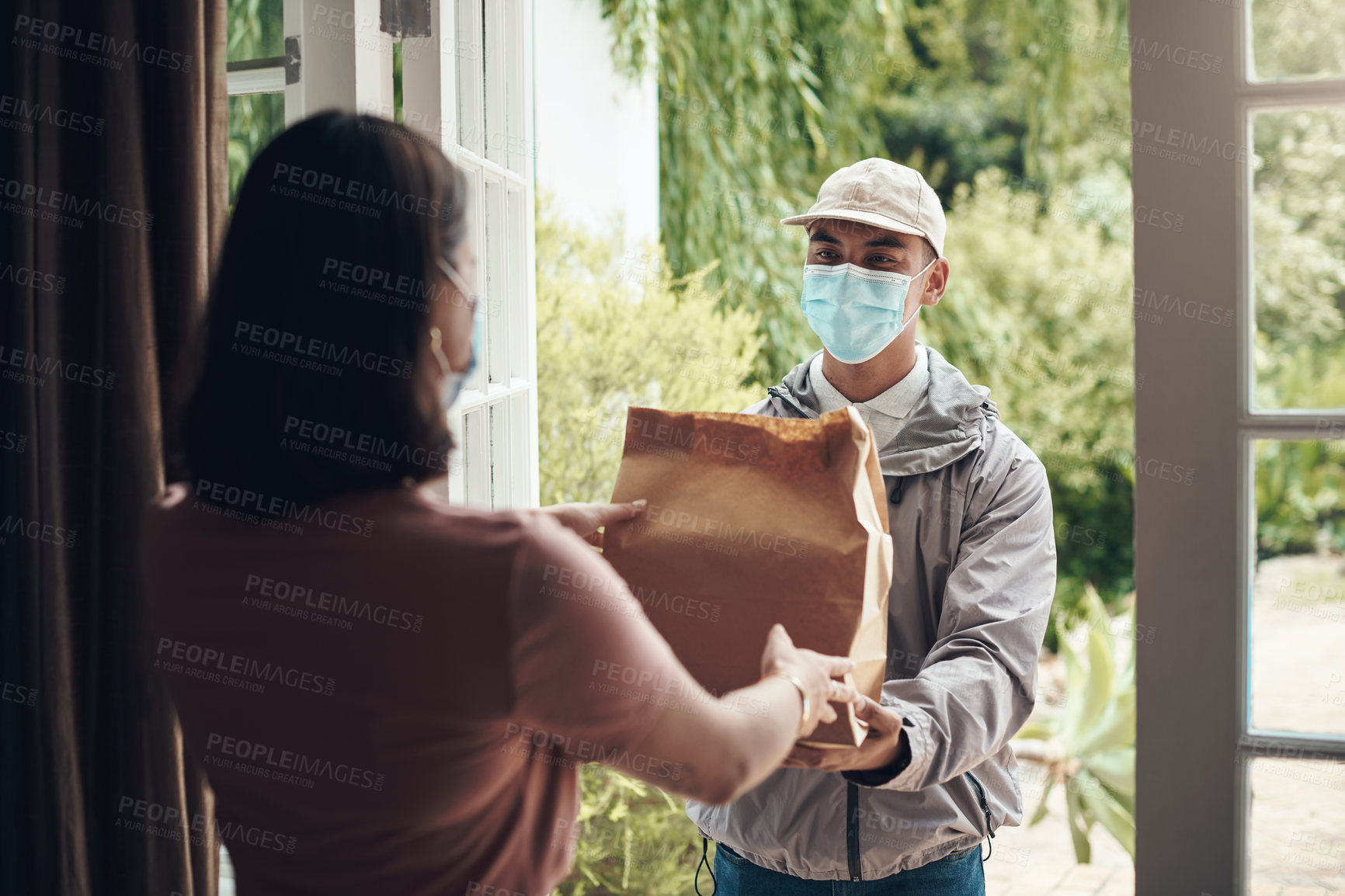 Buy stock photo Delivery man, package and woman with mask in home with ocd or germ protection, health and anxiety for bacteria. Female person, logistics and professional courier service for customer care and safety