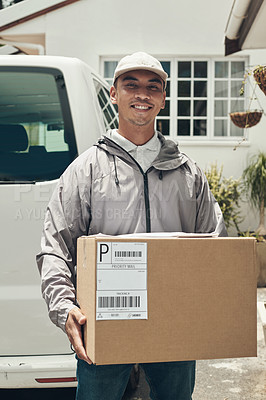 Buy stock photo Shot of a young man delivering a package to a customer at home