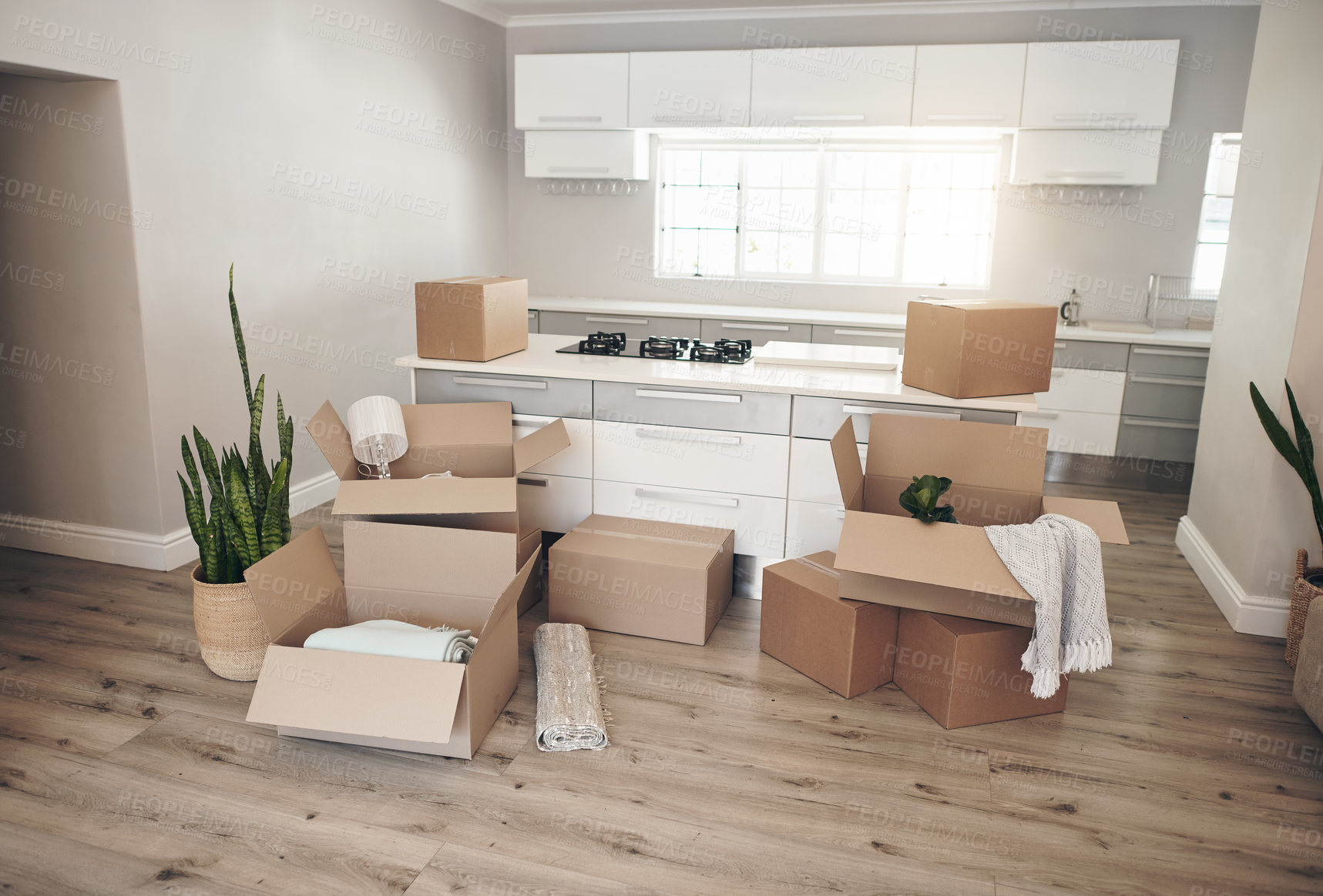 Buy stock photo Shot of a room full of boxes waiting to be unpacked on moving day