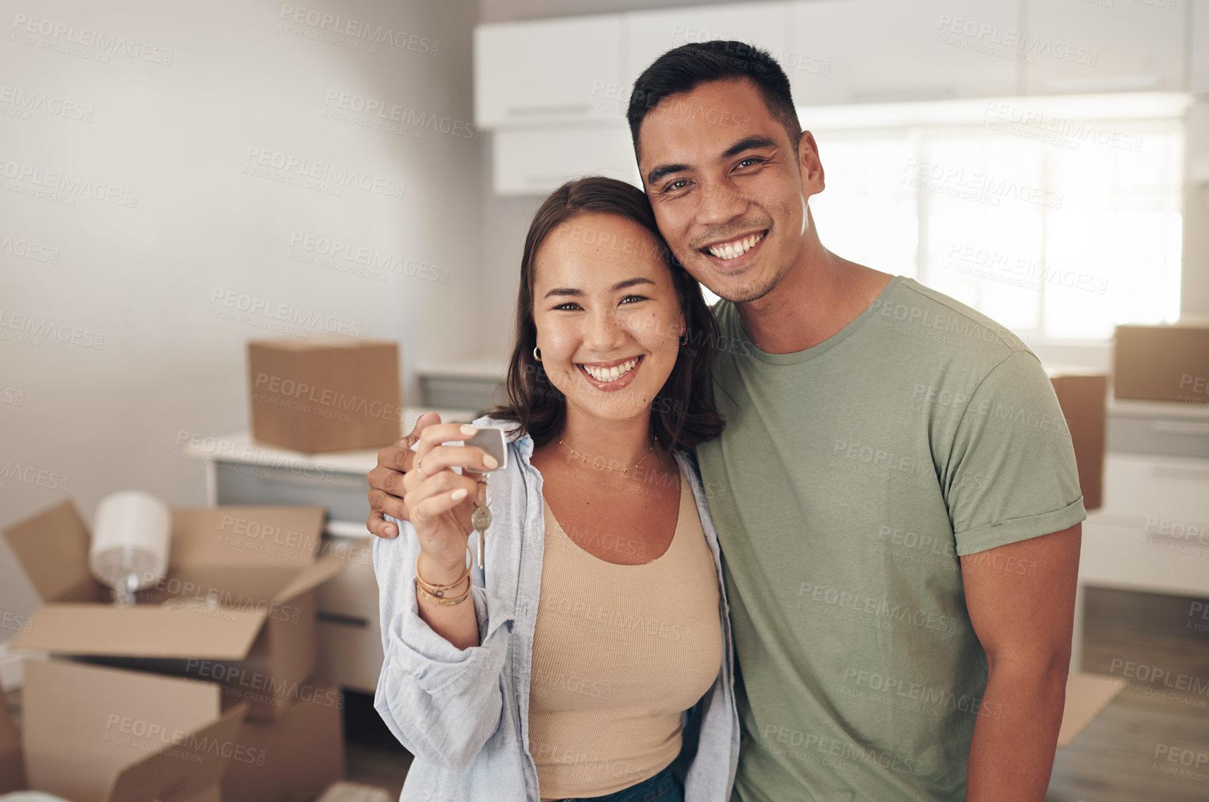 Buy stock photo Portrait, couple and happy in new home with boxes for moving in, satisfied and confident with ownership. Real Estate, relationship and smile with unpacking furniture, excited and positive on property