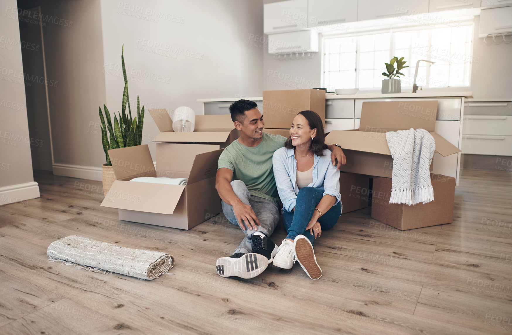 Buy stock photo Break, couple and happy in new home with boxes for moving in, satisfied and confident with ownership. House,
relationship and smile with unpacking furniture, excited and positive with property