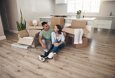 Buy stock photo Break, couple and smile in new home with boxes for moving in, satisfied and confident with ownership. House, relationship and happy with unpacking furniture, excited and positive with property